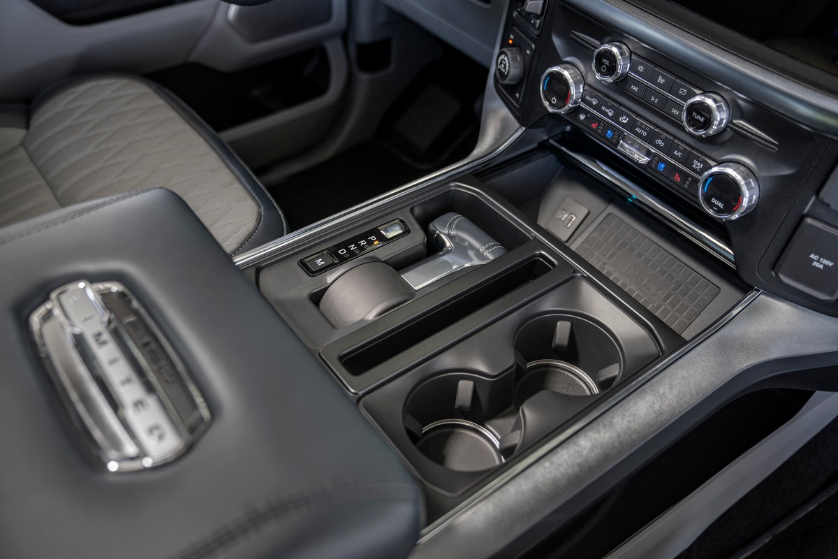 The all-new F-150 features and an available stowable shifter that easily folds into the center console of the all-new F-150 with the push of a button and allows full access to the large Interior Work Surface when in park.